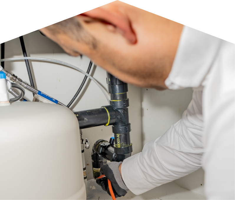 A Mersey plumbing specialist uses a hydro jet to clear a clogged drain. A Mersey plumbing specialist uses a hydro jet to clear a clogged drain.